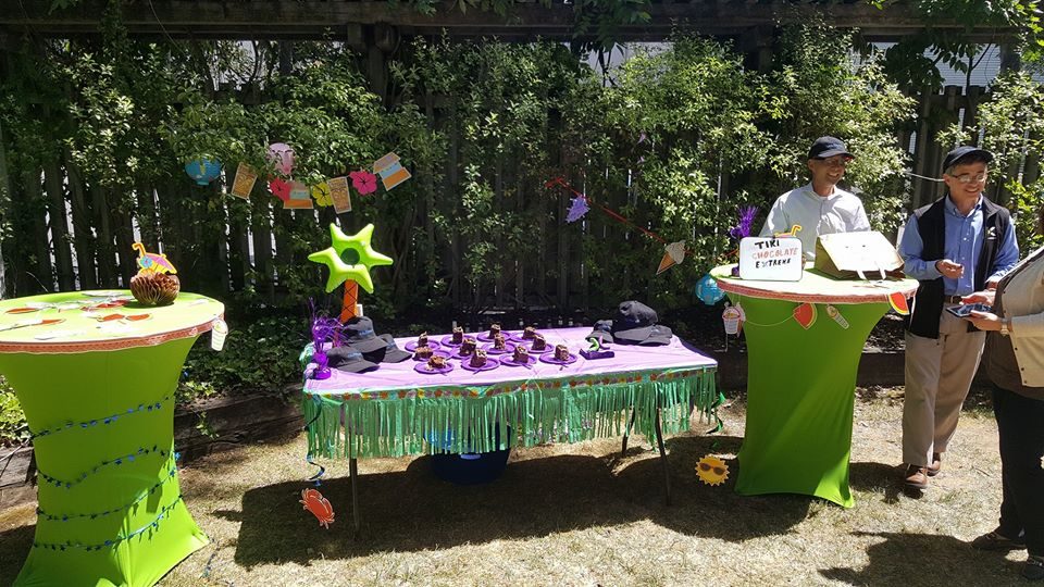 A jungle of color, cupcakes, and table decor.